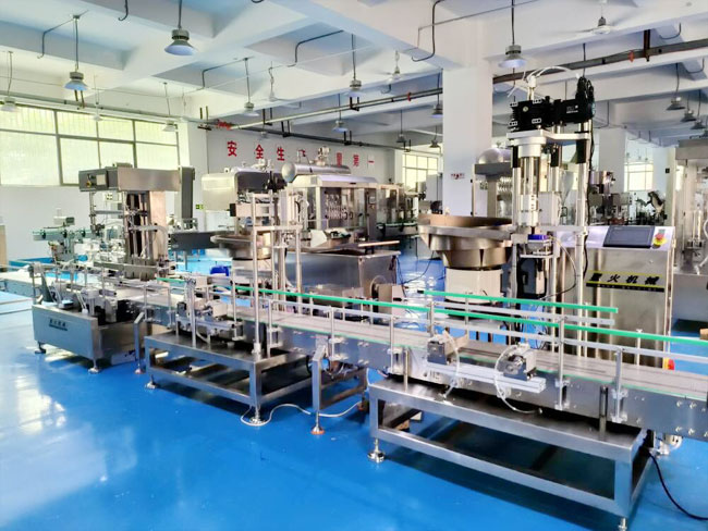 双头研磨液自动灌装机压塞旋盖生产线